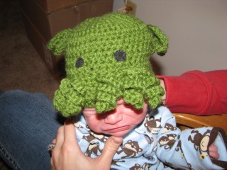 Newborn nephew Will sporting one of my ultra cool new baby Cthulhu Toques!
