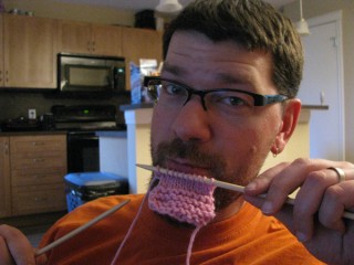 My handsome husband's first swatch. Note the garter AND stockinette stitches!